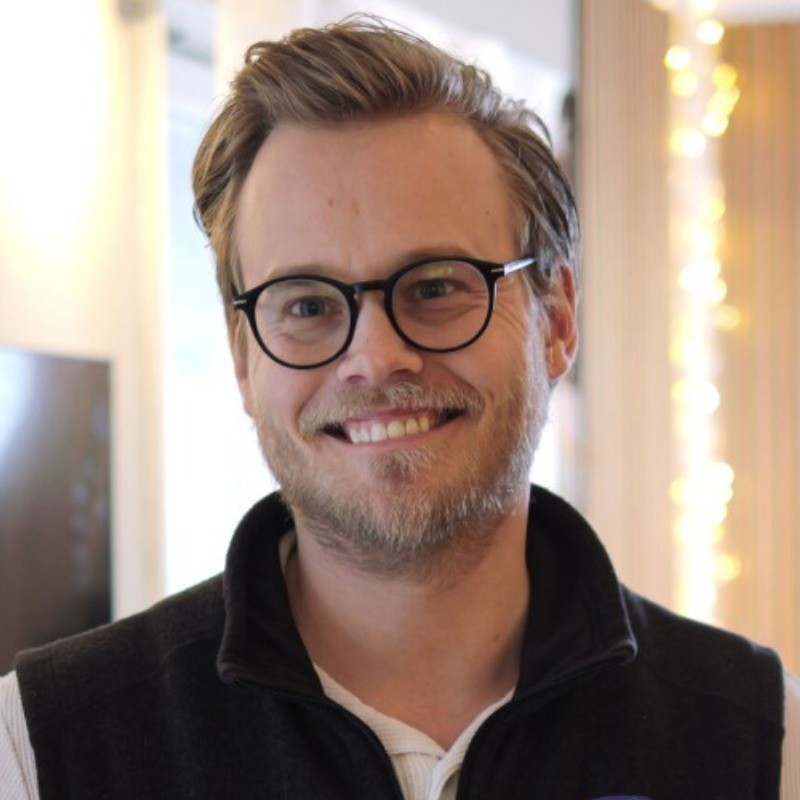 Headshot of Adam Holmgren